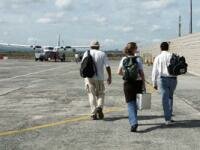 Boarding the flight at Miri airport. (99Kb)